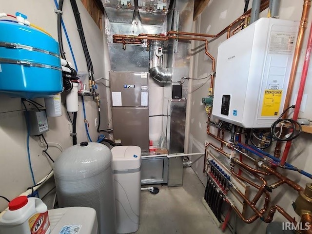 utility room with tankless water heater