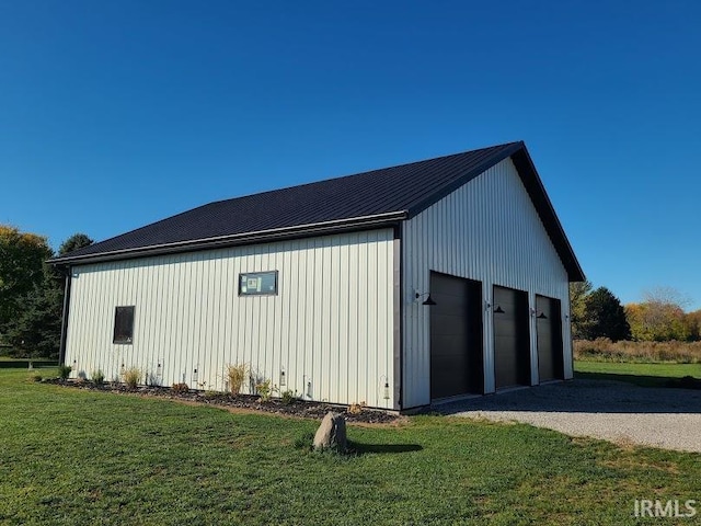 garage with a lawn