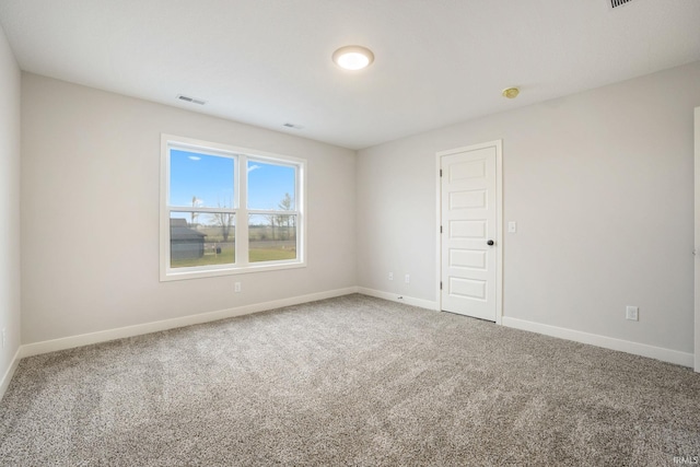 empty room featuring carpet floors