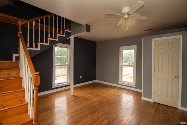 interior space with hardwood / wood-style flooring, ceiling fan, and a wealth of natural light