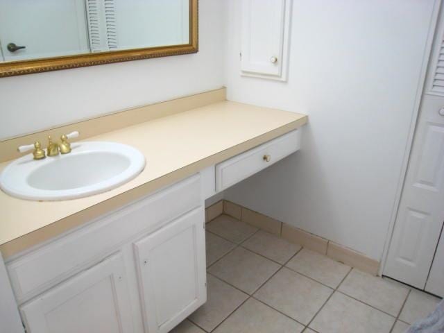 bathroom featuring vanity and tile patterned floors