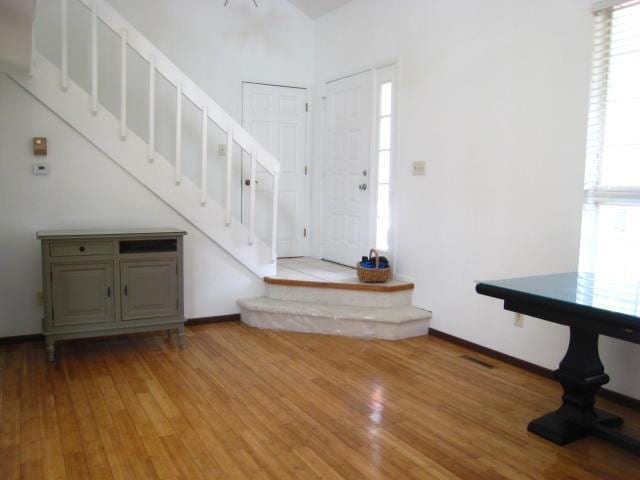 entrance foyer featuring hardwood / wood-style floors