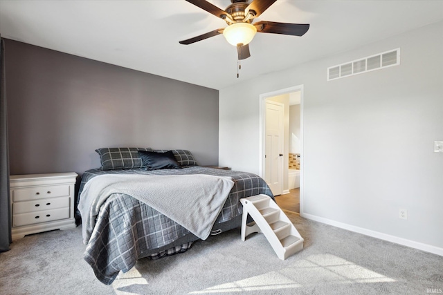 bedroom featuring light colored carpet and ceiling fan