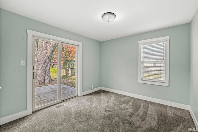 view of carpeted spare room