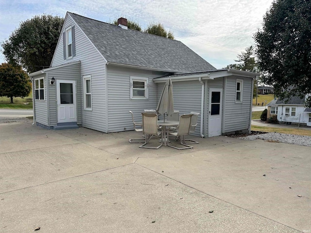 rear view of house featuring a patio area