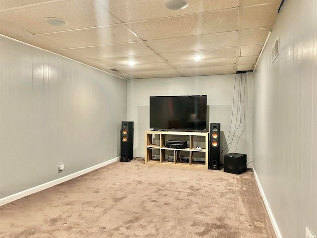 interior space featuring a drop ceiling and carpet floors