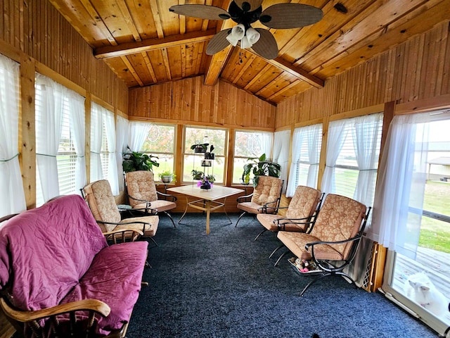 sunroom / solarium featuring lofted ceiling with beams, wooden ceiling, and ceiling fan