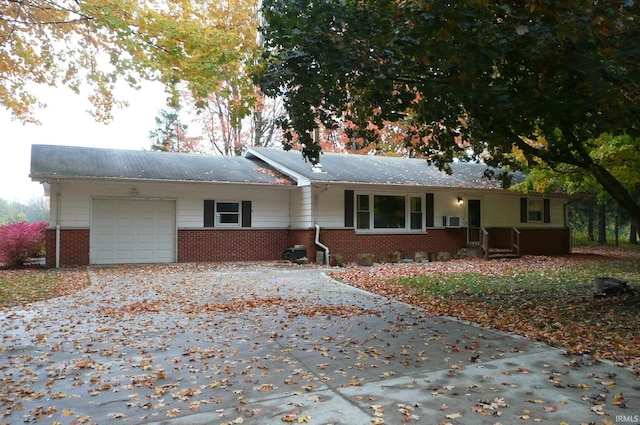 ranch-style home with a garage