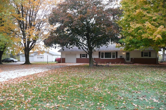 ranch-style home with a front yard