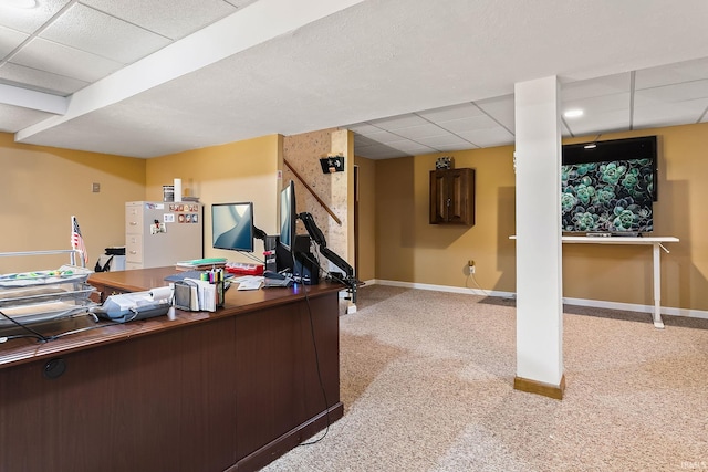 office area featuring carpet floors and a drop ceiling