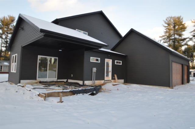 view of front of property with an attached garage and entry steps