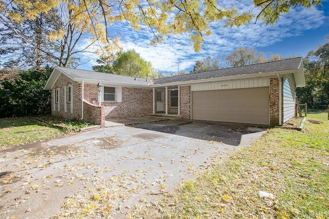 ranch-style home featuring a garage