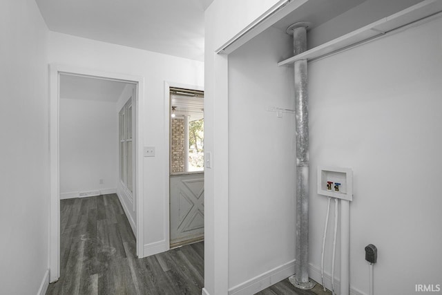 clothes washing area with hookup for a washing machine and dark hardwood / wood-style floors