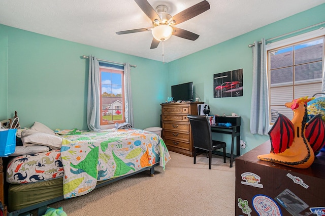 bedroom with carpet flooring and ceiling fan