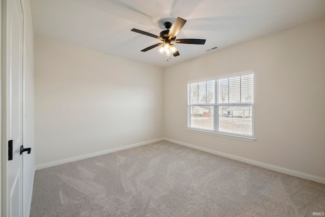 4848 Abbeyville Dr, Lafayette, IN 47909 - unfurnished room with light colored carpet, a ceiling fan, and baseboards