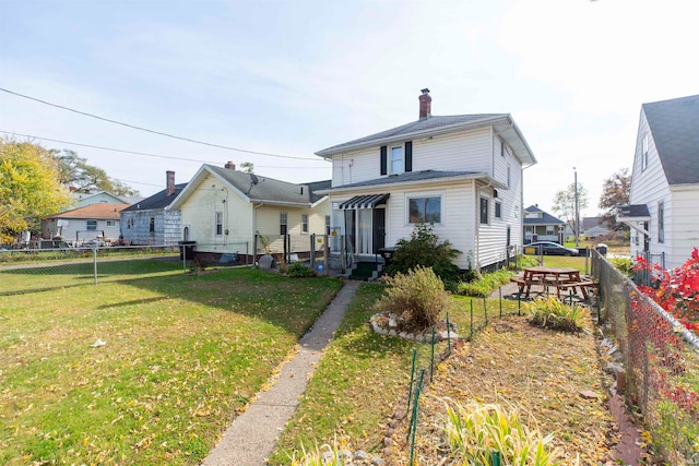 view of front of house with a front yard