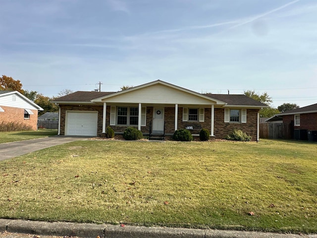 view of front facade featuring a garage, a front lawn, and a porch