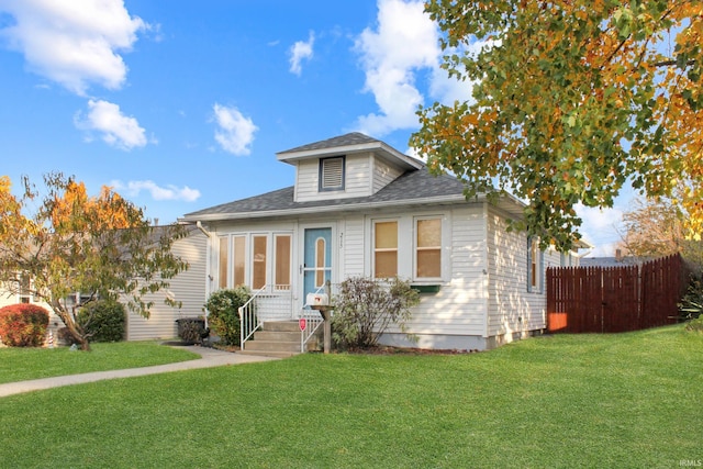 bungalow with a front lawn