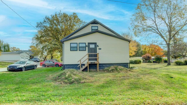 201 S 1st St, Holland, IN 47541 - rear view of property with entry steps and a yard