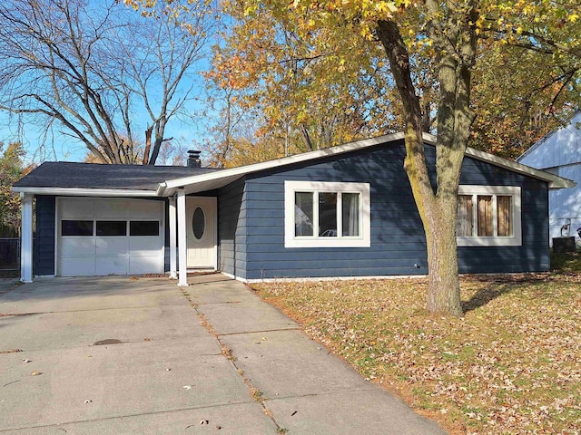 single story home with a garage