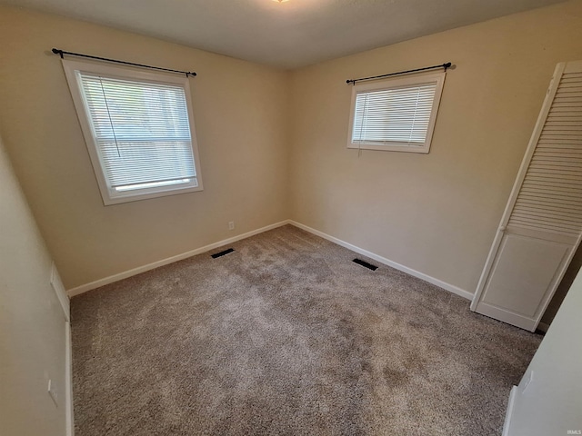 view of carpeted spare room