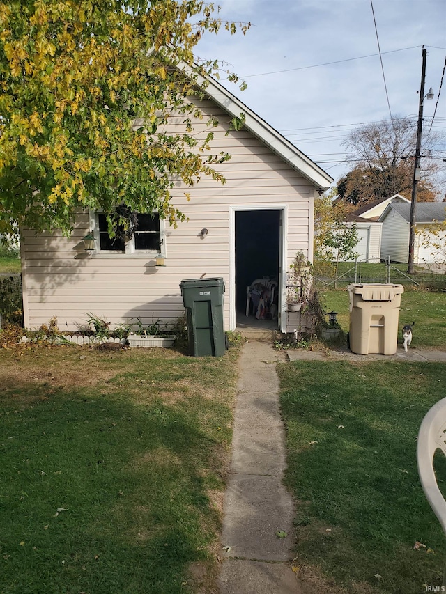 garage featuring a yard