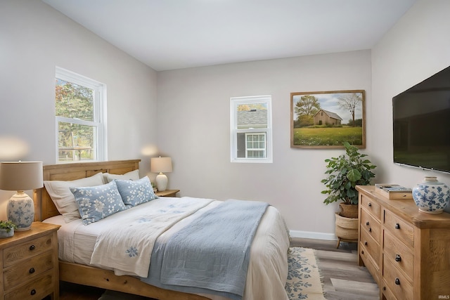 bedroom featuring light hardwood / wood-style floors