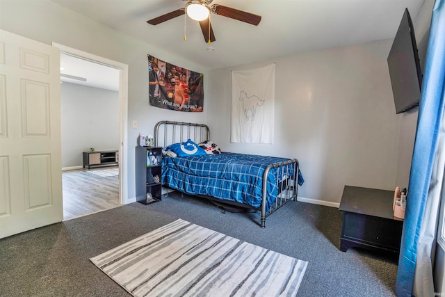 bedroom featuring hardwood / wood-style floors and ceiling fan