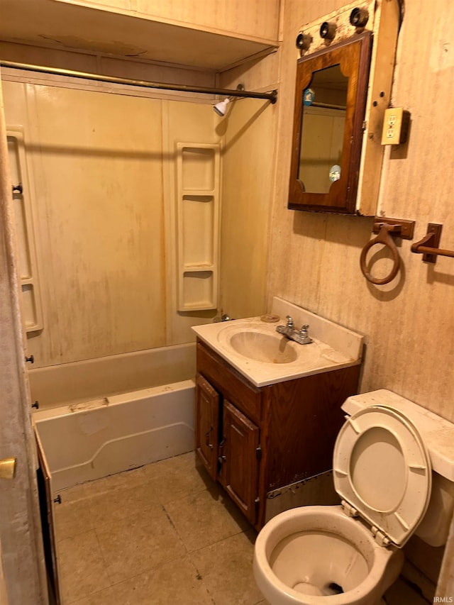 full bathroom with toilet, vanity, tile patterned floors, and shower / bathtub combination