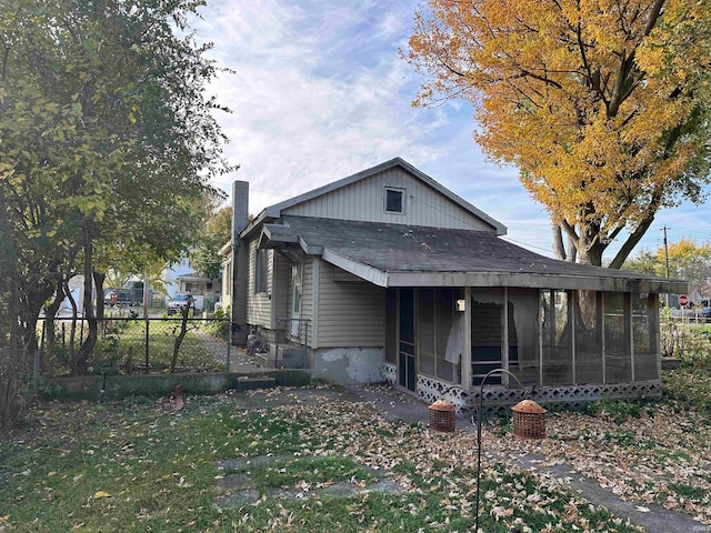 view of front facade featuring a sunroom