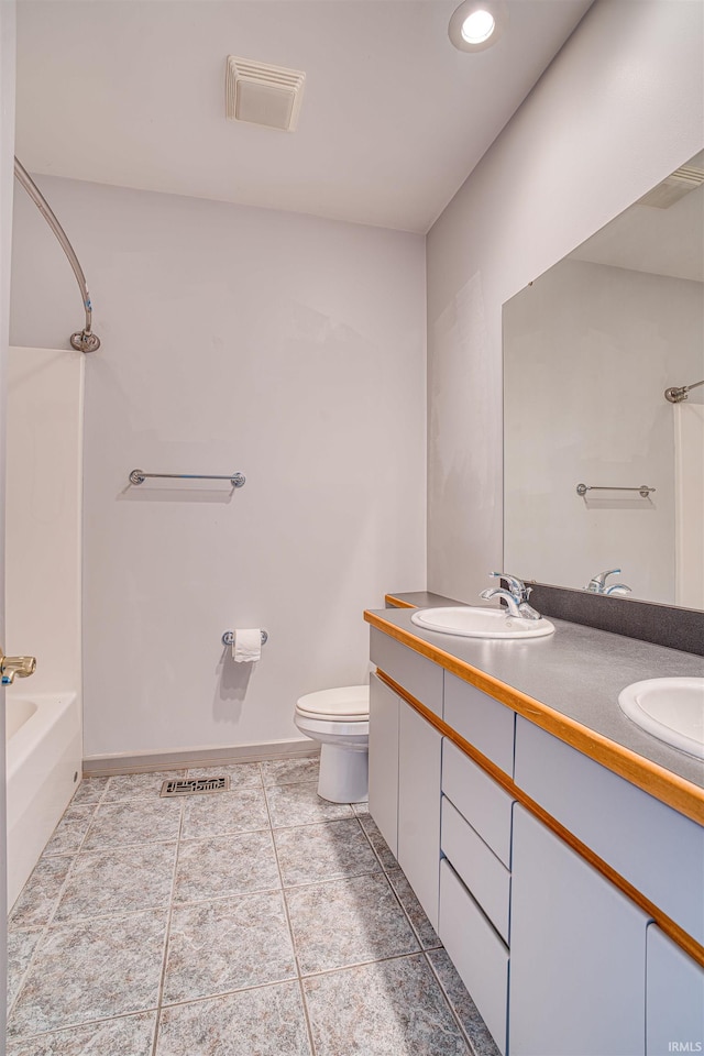 full bathroom with vanity, toilet, bathtub / shower combination, and tile patterned floors