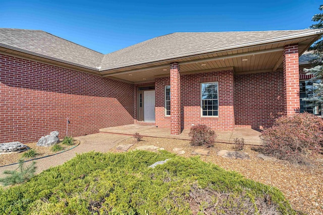 property entrance with a patio area