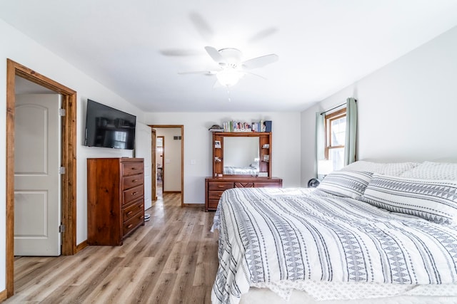 bedroom featuring ceiling fan and light hardwood / wood-style flooring