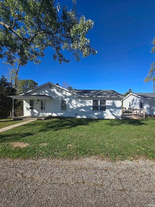 view of home's exterior with a yard