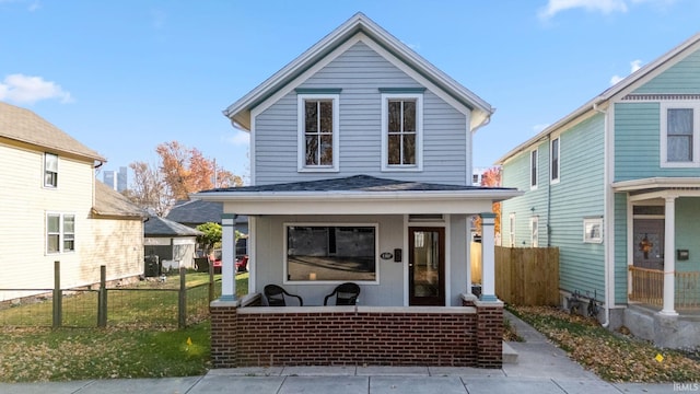 view of property with a porch