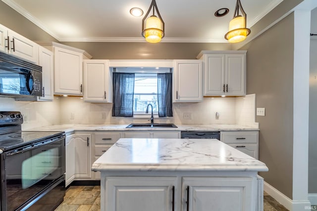 kitchen featuring white cabinetry, black appliances, sink, and hanging light fixtures