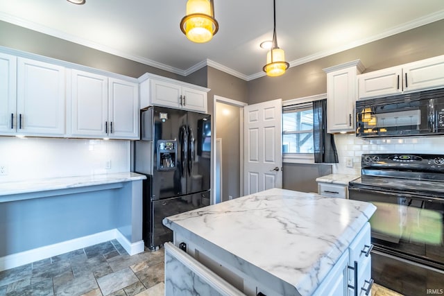 kitchen with decorative backsplash, white cabinetry, black appliances, and decorative light fixtures