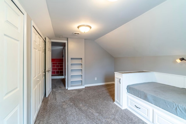 carpeted bedroom featuring vaulted ceiling