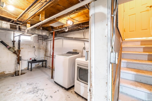 basement featuring washing machine and dryer