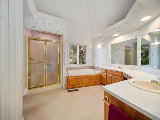 bathroom with vanity, crown molding, independent shower and bath, and vaulted ceiling