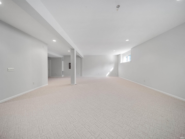 basement with light carpet