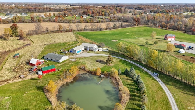 aerial view featuring a rural view and a water view