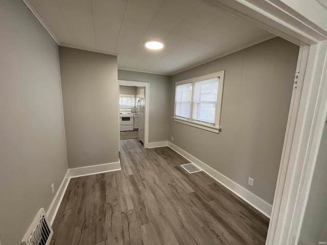 hallway featuring hardwood / wood-style flooring