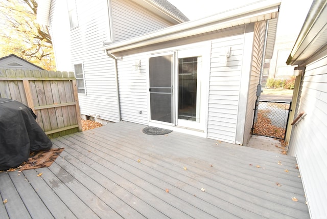 wooden deck featuring grilling area