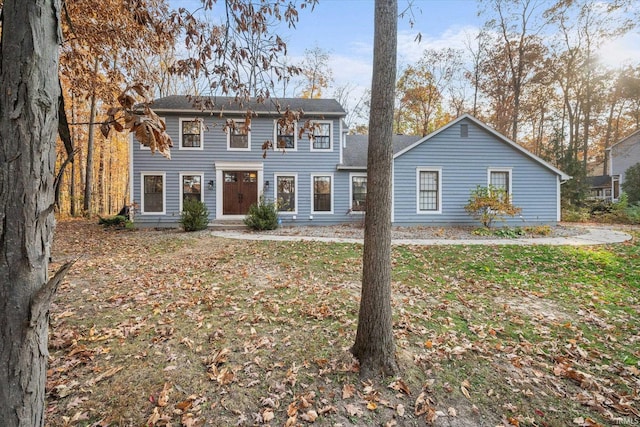 view of front facade with a front yard