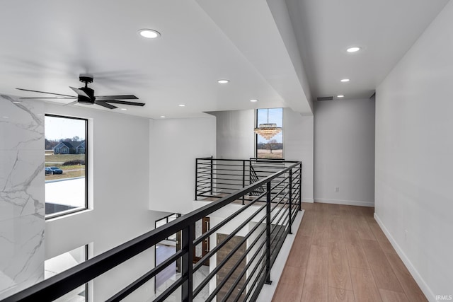 corridor featuring light hardwood / wood-style floors