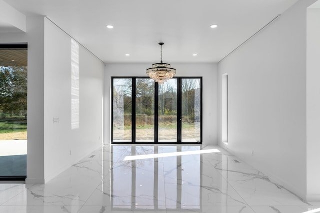 interior space featuring a chandelier