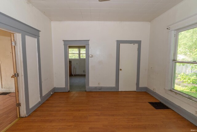 1815 Elwood Ave, South Bend, IN 46628 - unfurnished room with light wood-type flooring and baseboards