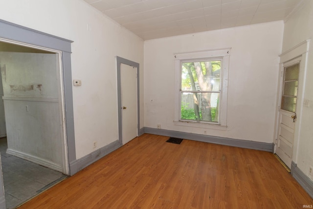 1815 Elwood Ave, South Bend, IN 46628 - empty room with light wood-style flooring and baseboards