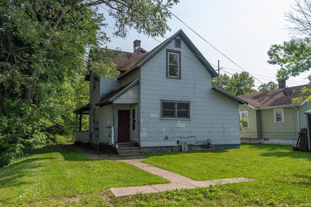 1815 Elwood Ave, South Bend, IN 46628 - view of front of house featuring a front lawn